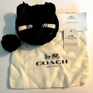 NWT Coach Raccoon coin purse.